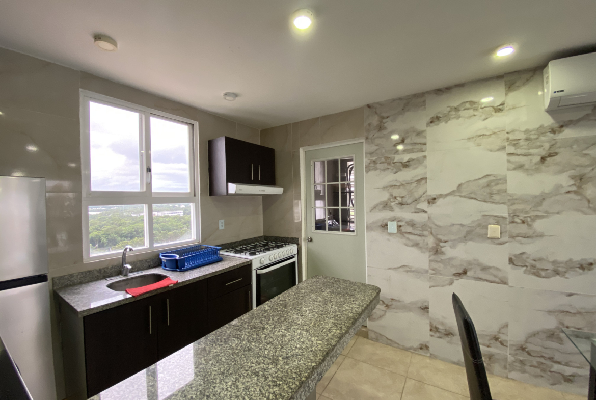 Cocina del departamento en venta en Residencial Dream Lagoons Cancún