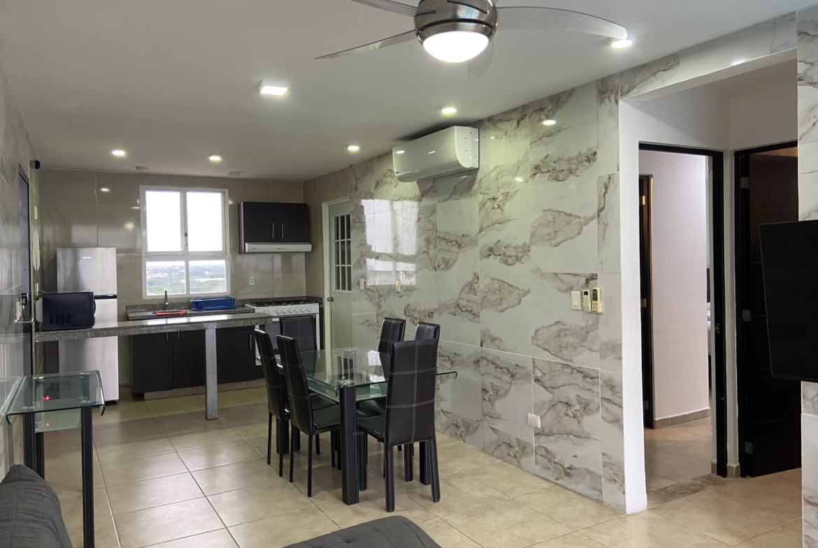 Sala y comedor del departamento en venta en Dream Lagoon Cancún