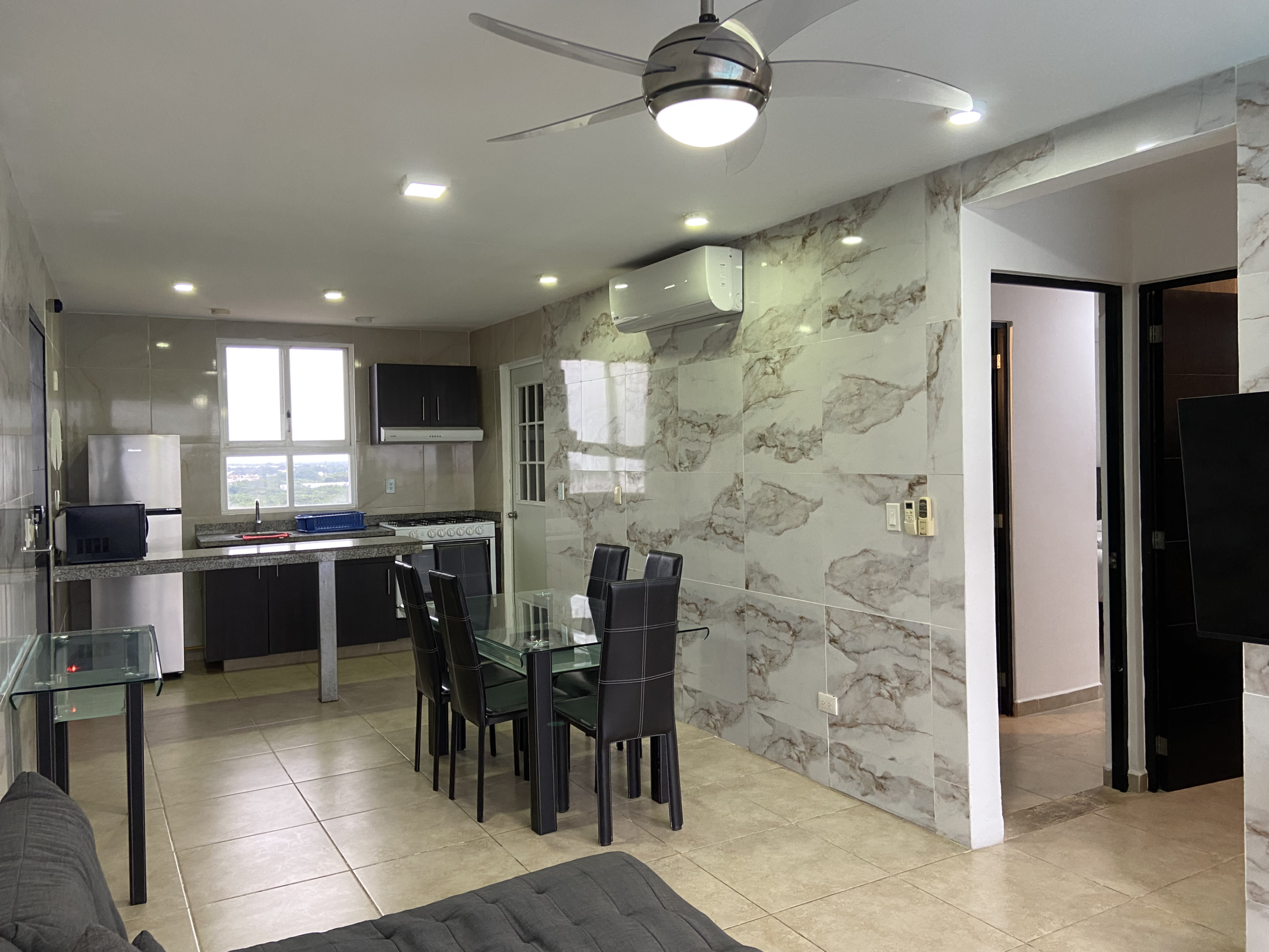 Sala y comedor del departamento en venta en Dream Lagoon Cancún