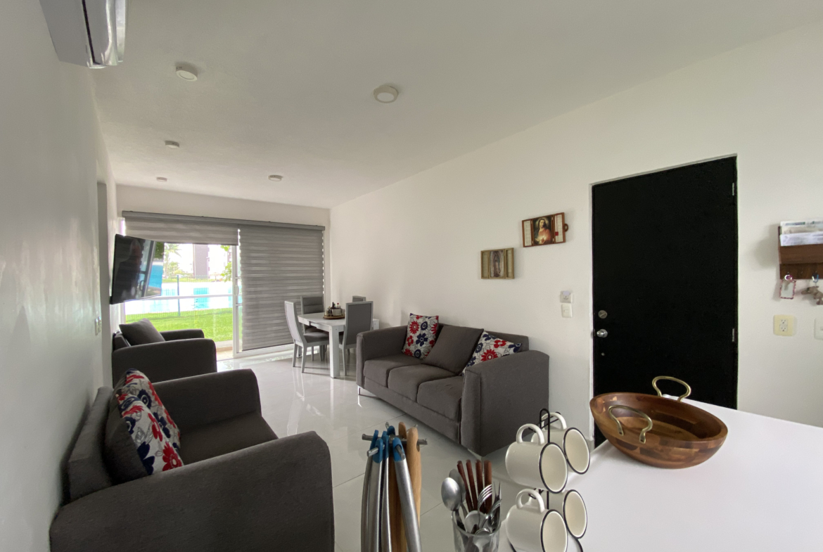 Comedor y Sala del departamento planta baja en venta en Dream Lagoons Cancún