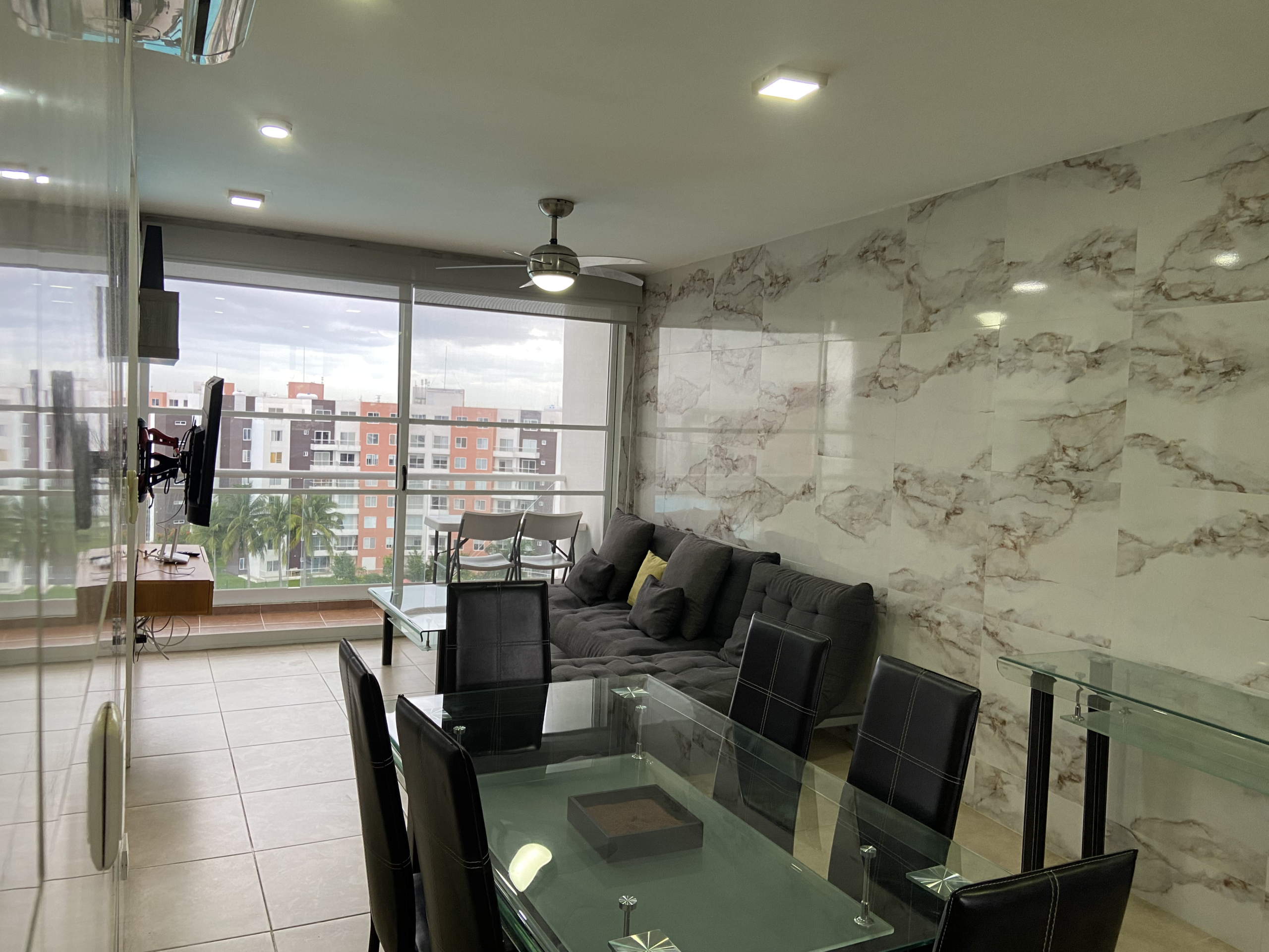 Comedor y Sala del departamento en Residencial Dream Lagoos, Cancún