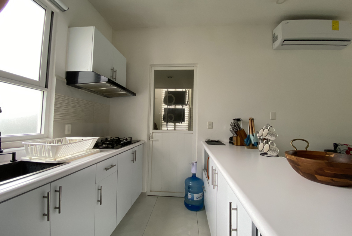 Cocina del departamento planta baja en Dream Lagoons Cancún.