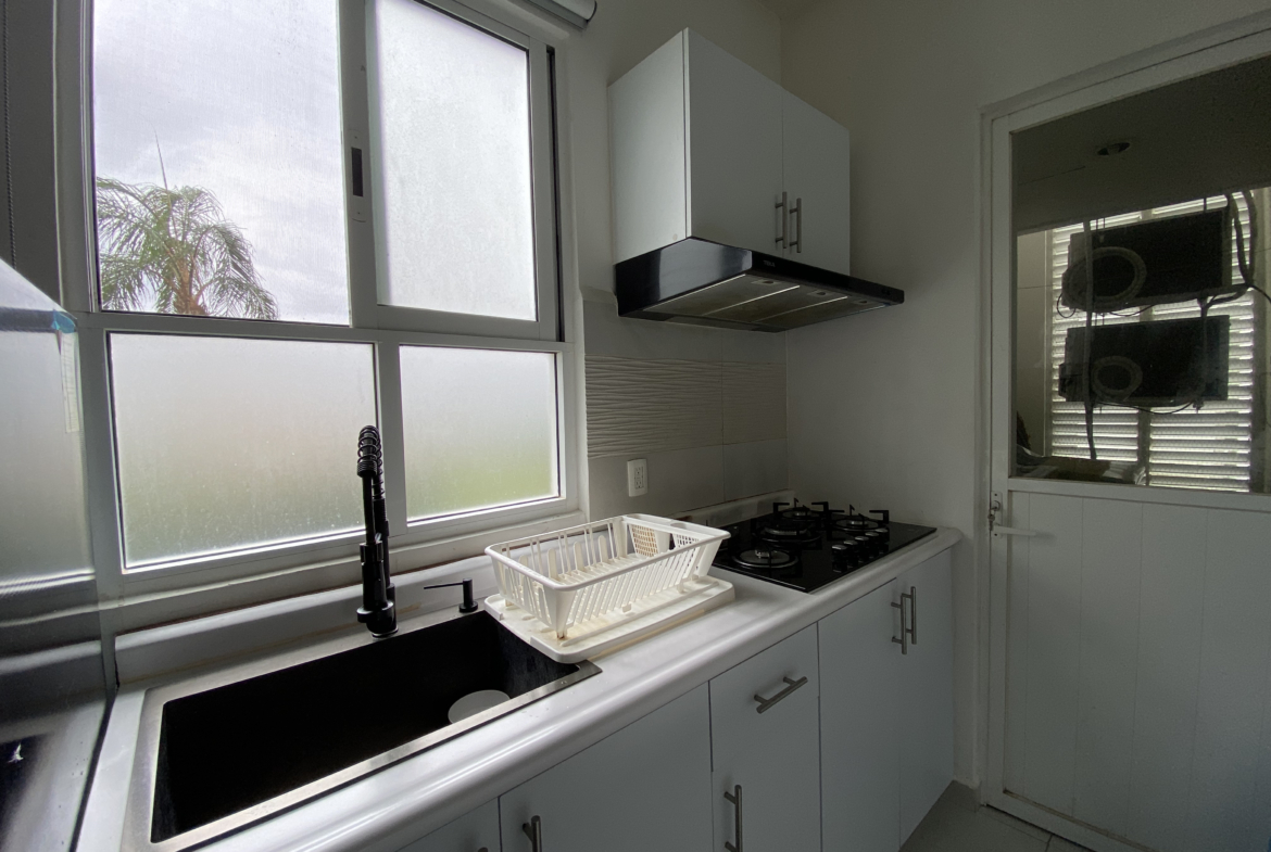 Cocina integral de un departamento planta baja en Dream Lagoons Cancún