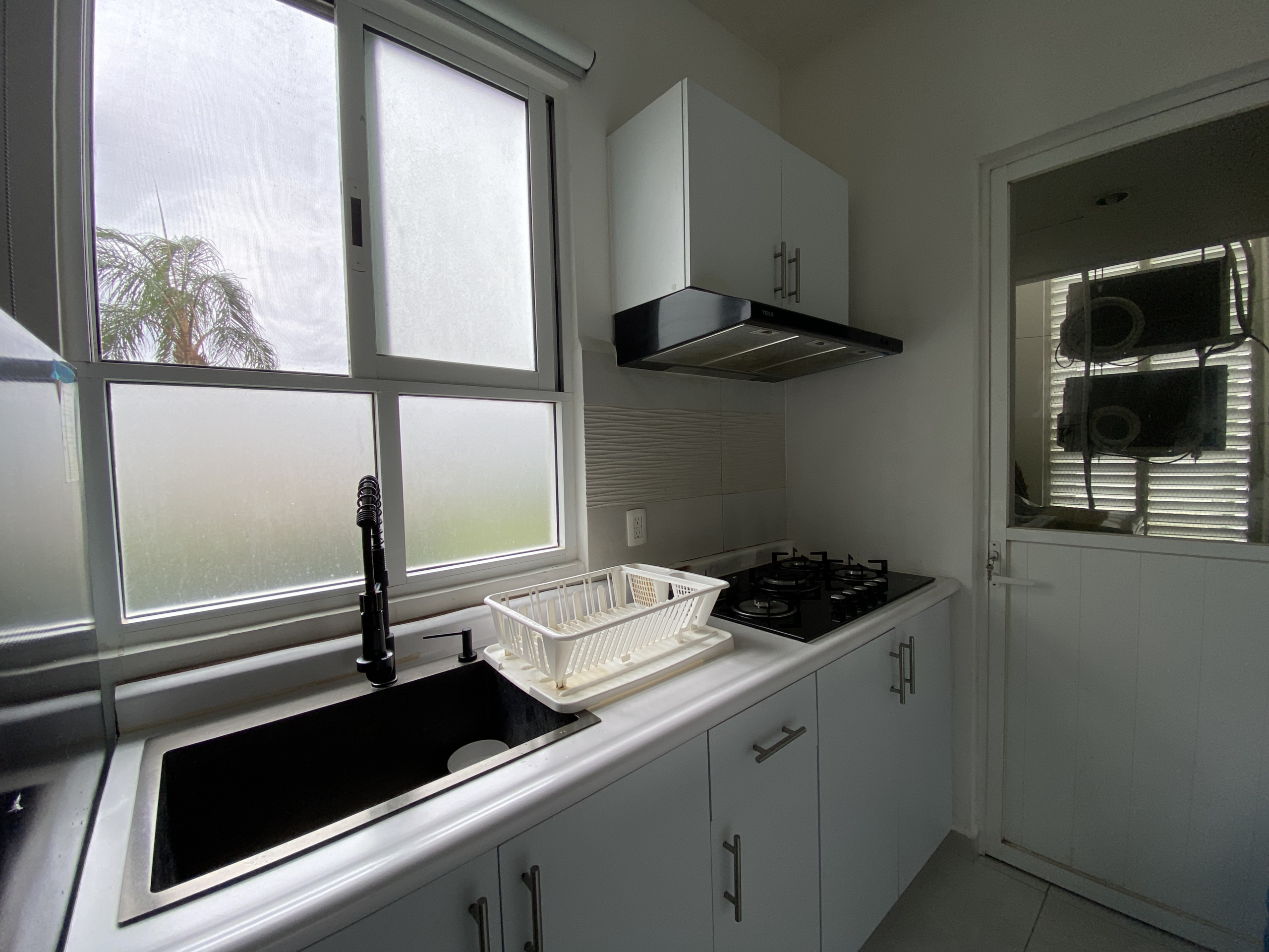 Cocina integral de un departamento planta baja en Dream Lagoons Cancún