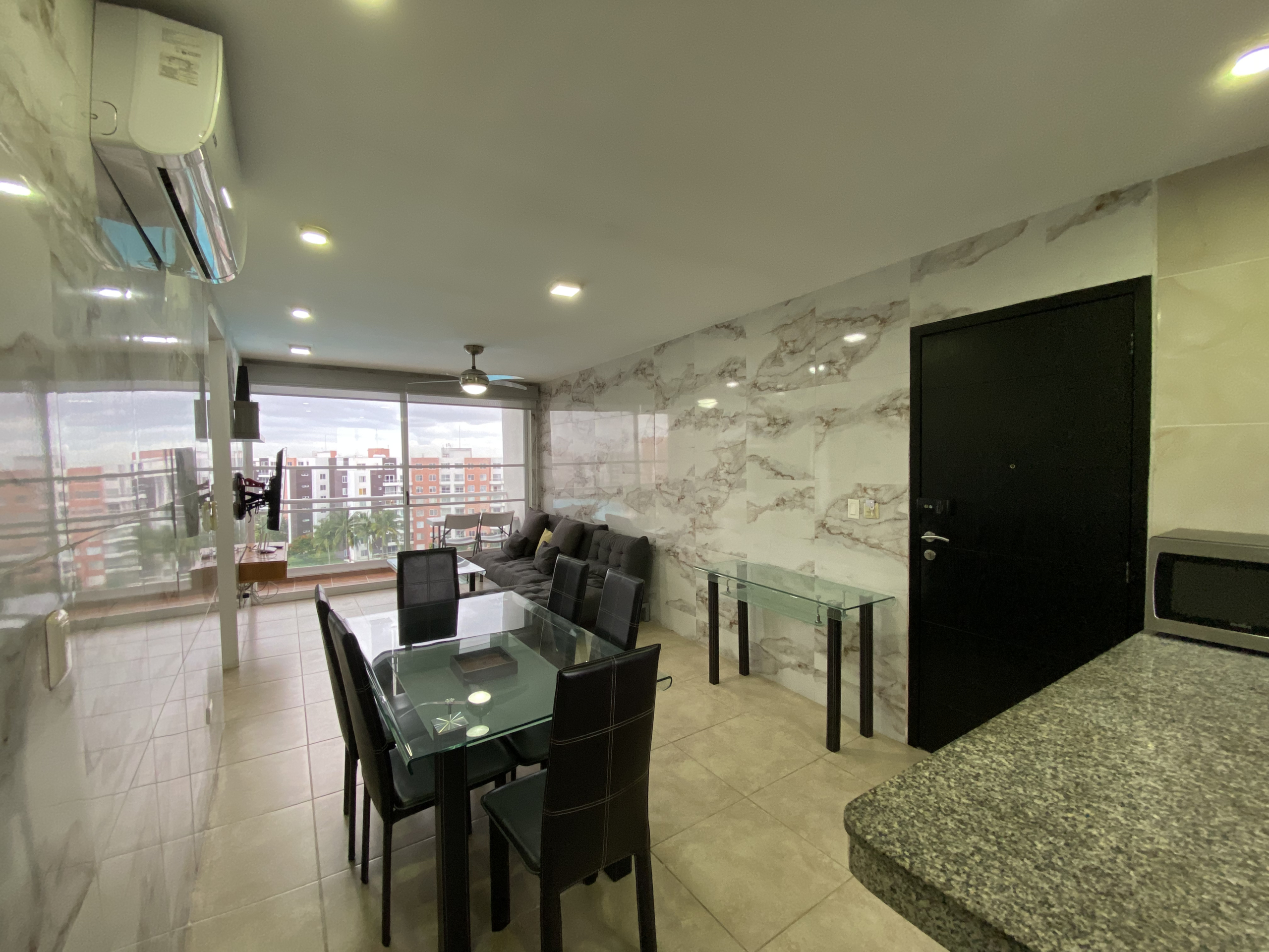 Sala y comedor del departamento en venta en Dream Lagoons Cancún